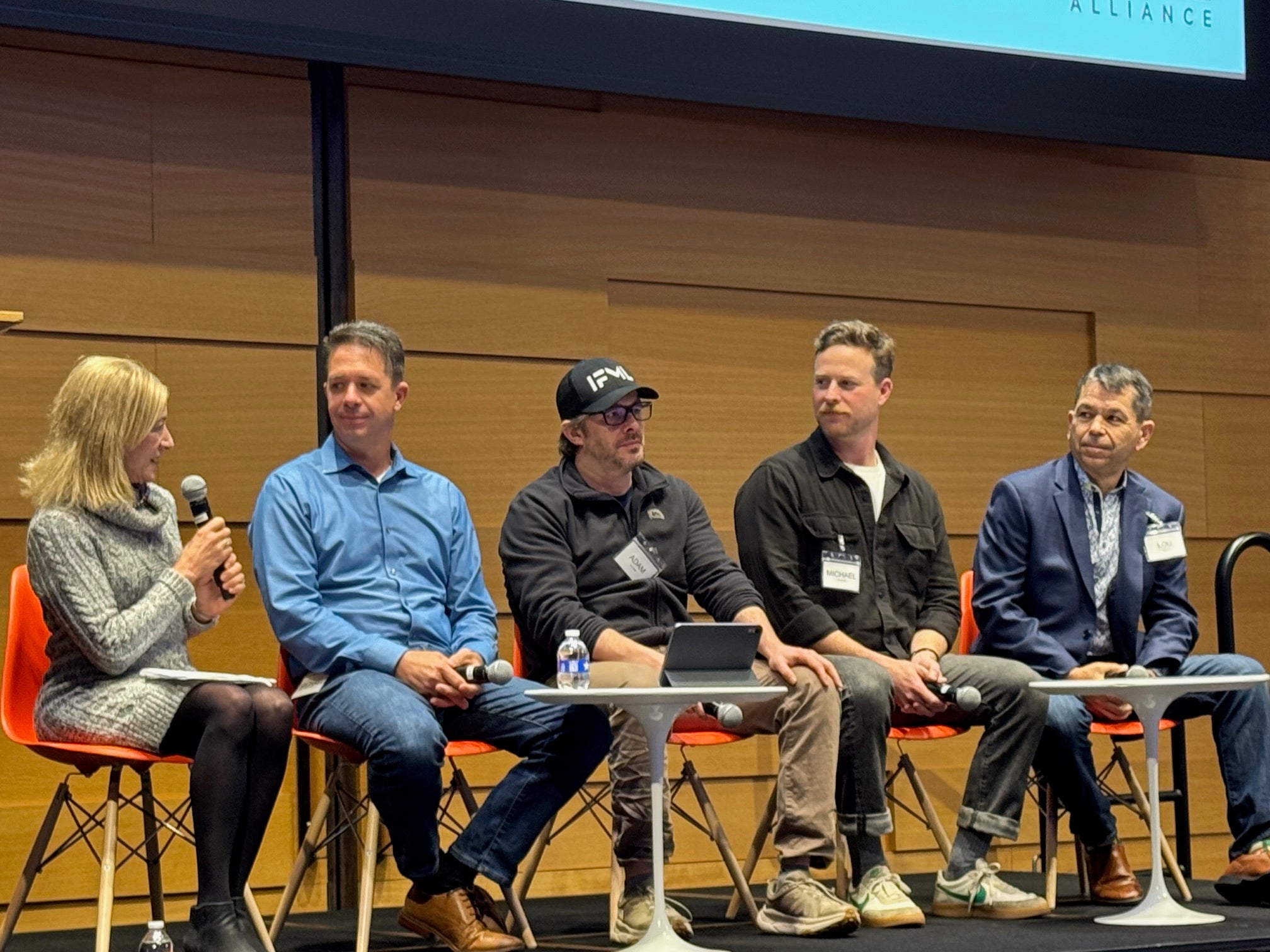 Good Systems’ Sherri Greenberg (left), an Austin AI Alliance board member, moderates a panel discussion at the Alliance’s State of AI in Austin event in February.