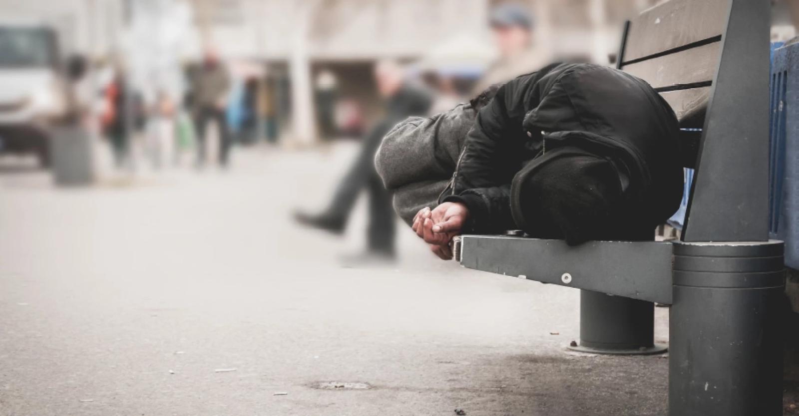 Homeless man on bench