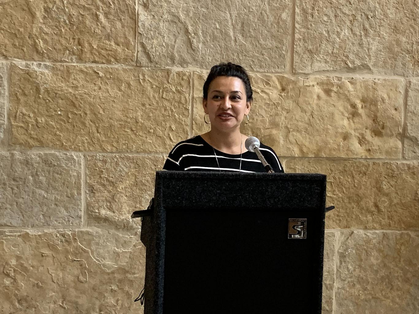 Miriam Solis speaks at the Austin Civilian Conservation Corps Photovoice Exhibition Reception. Photo Credit: Weston Rose Miriam Solis speaks at the Austin Civilian Conservation Corps Photovoice Exhibition Reception. Photo Credit: Weston Rose