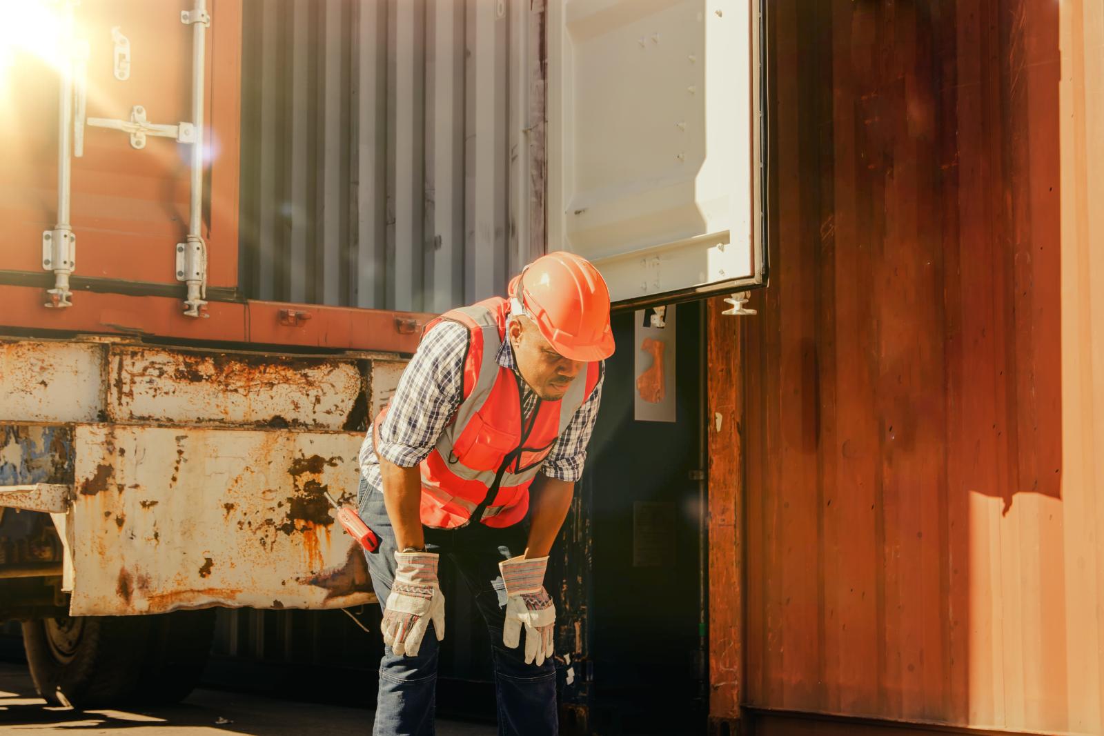 A worker struggles in the heat A worker struggles in the heat (Adobe Stock Image #637159967)