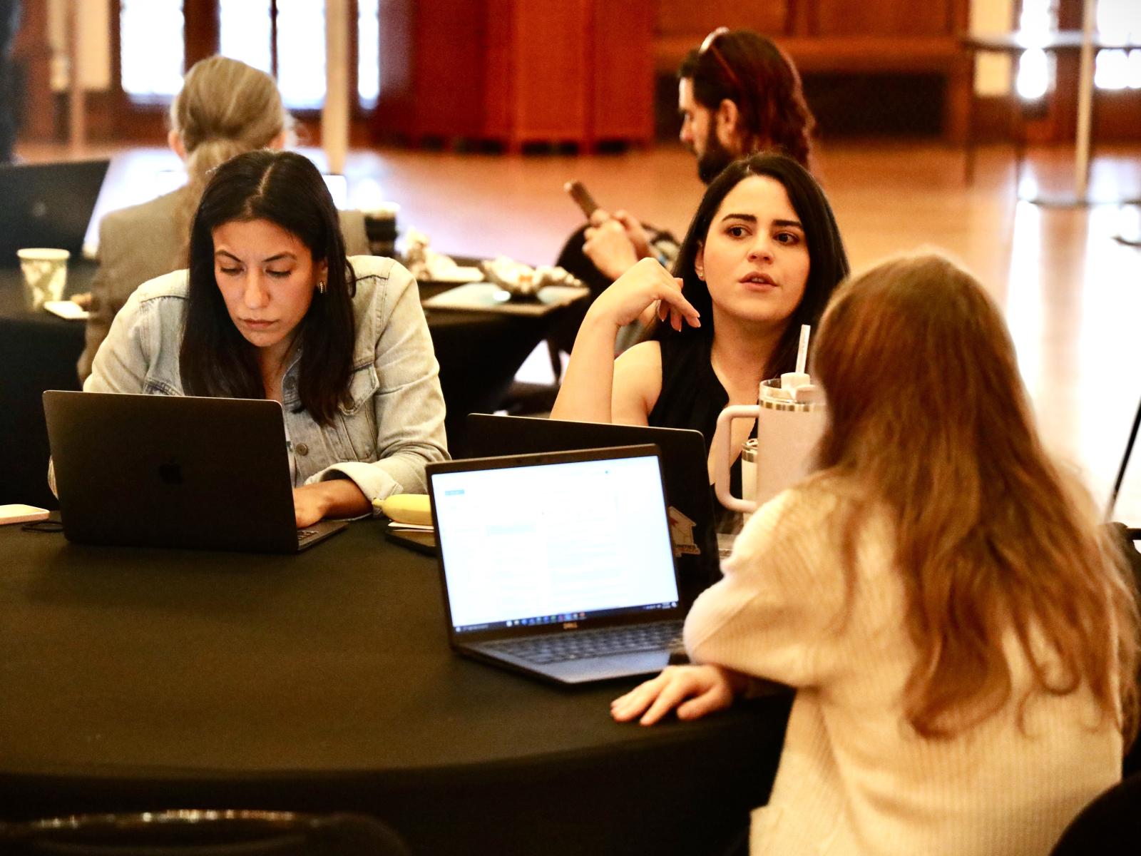 Researchers at work on their proposals at WCWH's inaugural flash funding competition