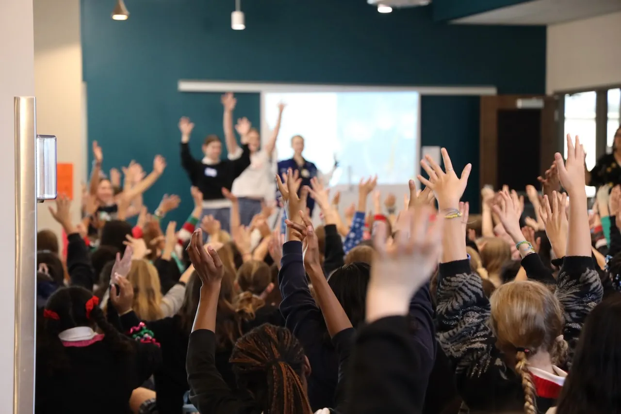 People raising hands