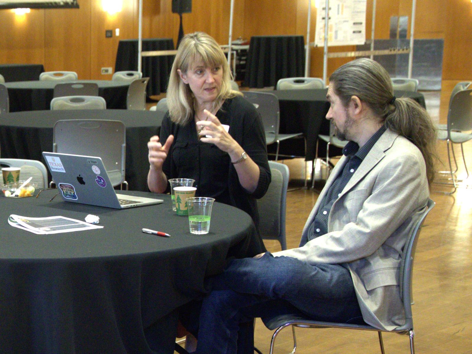 Two members of the winning team, Leah Whigham (College of Natural Sciences) and Pawel Misztal (Cockrell School of Engineering), discuss their proposal at this year’s flash funding competition on February 6, at UT Austin.