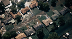 Floodwater surrounding homes in Beaumont, Texas (Source: Alyssa Schukar for The New York Times)