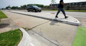 Man walking on sidewalk