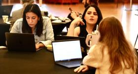 Researchers at work on their proposals at WCWH's inaugural flash funding competition