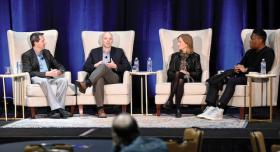 UT professor Matthew Lease speaks on a panel about the ethics and policy of AI at the TAMEST conference