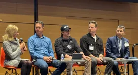 Good Systems’ Sherri Greenberg (left), an Austin AI Alliance board member, moderates a panel discussion at the Alliance’s State of AI in Austin event in February.