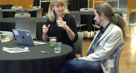 Two members of the winning team, Leah Whigham (College of Natural Sciences) and Pawel Misztal (Cockrell School of Engineering), discuss their proposal at this year’s flash funding competition on February 6, at UT Austin.