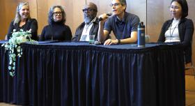 Edison Thomaz (second from right), an associate professor of electrical and computer engineering, speaks at this year’s Whole Communities–Whole Health Research Symposium, held at UT Austin on February 6. Joining him on the panel, from left to right: Kerry Kinney, Isela Guerra, Charles Moody, Jr. and Yan Zhang.