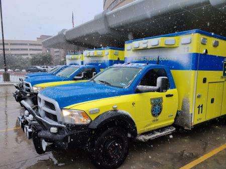 Ambulance in snowy parking lot