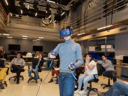 student demonstrates a VR game