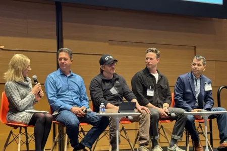 Good Systems’ Sherri Greenberg (left), an Austin AI Alliance board member, moderates a panel discussion at the Alliance’s State of AI in Austin event in February.