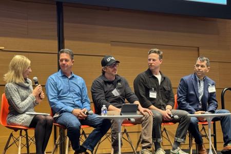 Good Systems’ Sherri Greenberg (left), an Austin AI Alliance board member, moderates a panel discussion at the Alliance’s State of AI in Austin event in February.